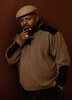 Charles Dutton in a old school kangol and sweatsuit.jpg