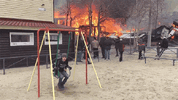 child-swinging-during-a-fire.gif