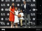 toronto-raptors-executive-masai-ujiri-poses-for-a-photo-with-his-wife-ramatu-daughter-zahara-a...jpg