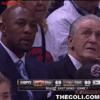 Alonzo Mourning sipping drink at game.gif