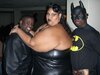 fat girl with dude in batman costume.jpg