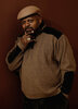 Charles Dutton in a old school kangol and sweatsuit.jpg