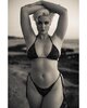 Stefania-Ferrario-with-her-arms-up.jpg