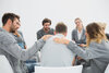 photodune-8484407-group-therapy-in-session-sitting-in-a-circle-with-therapist-s.jpg