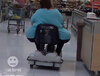 Fat woman on a scooter in Walmart.jpg